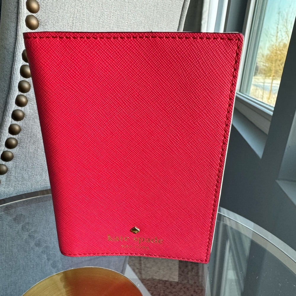 Kate spade passport holder in coral